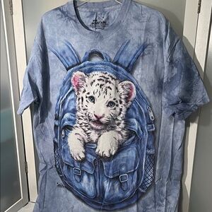 The Mountain Blue T-Shirt with a baby Snow Leopard in Backpack